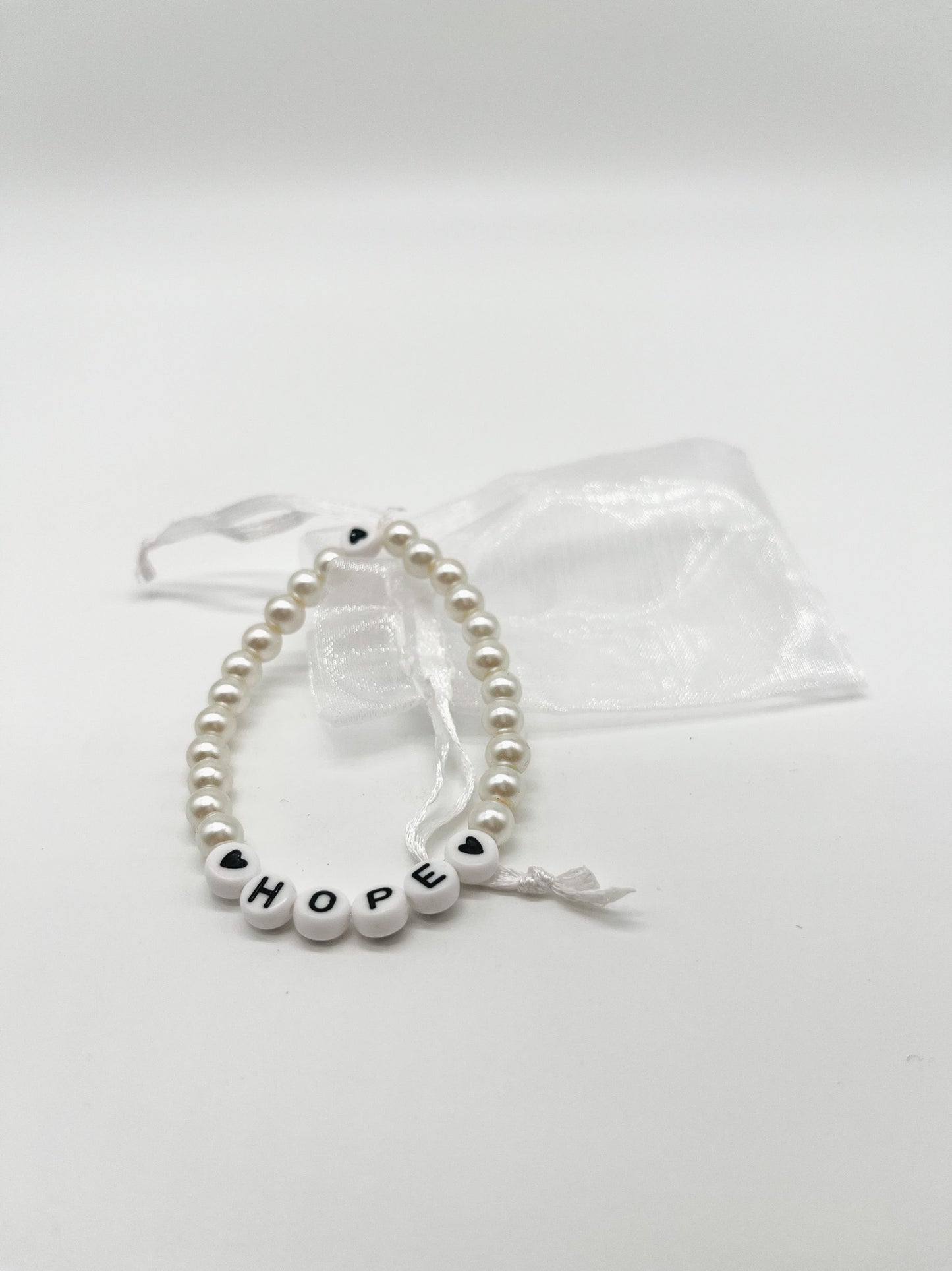 One World | Perlenarmband - Empovver