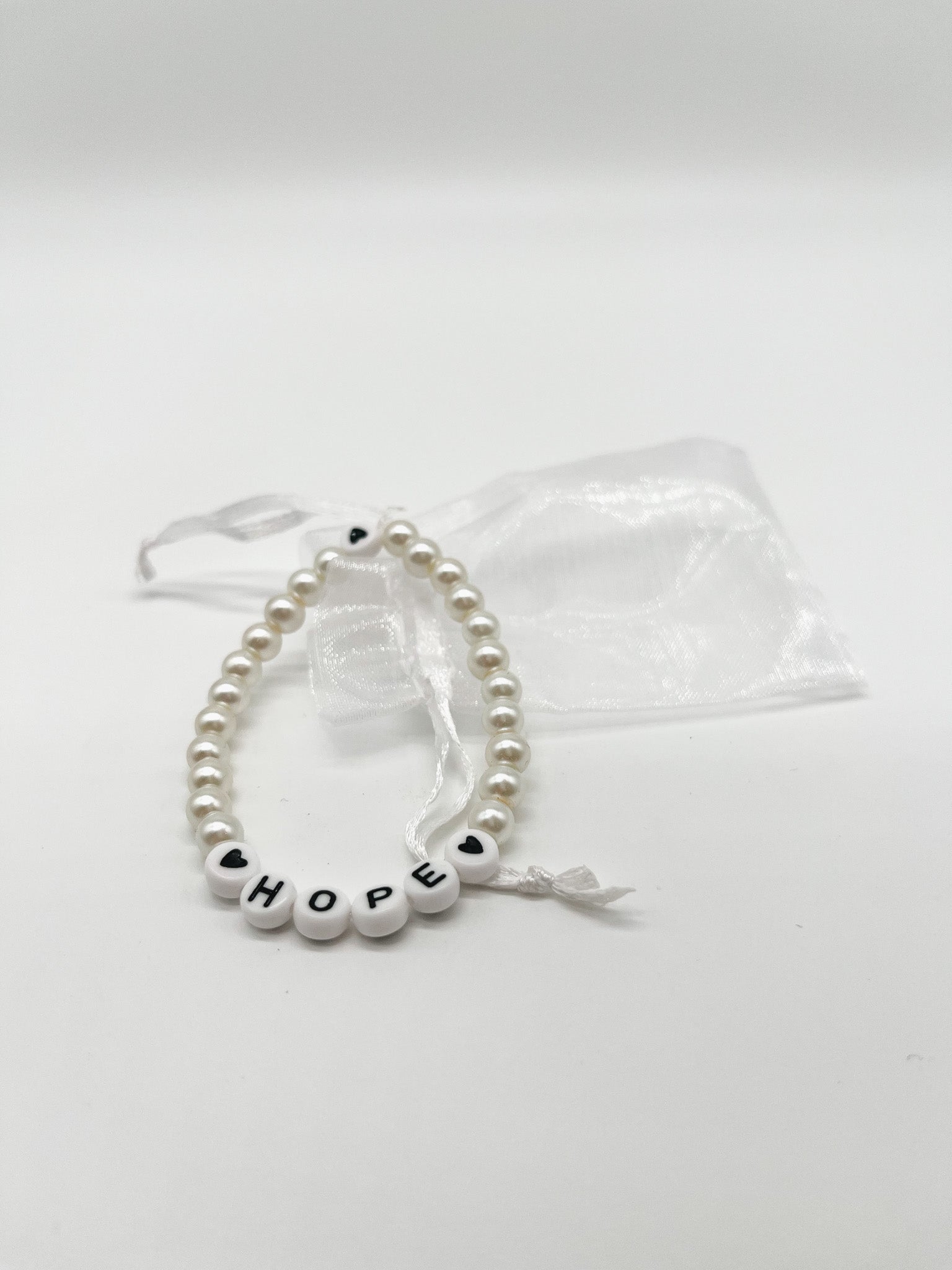 One World | Perlenarmband - Empovver