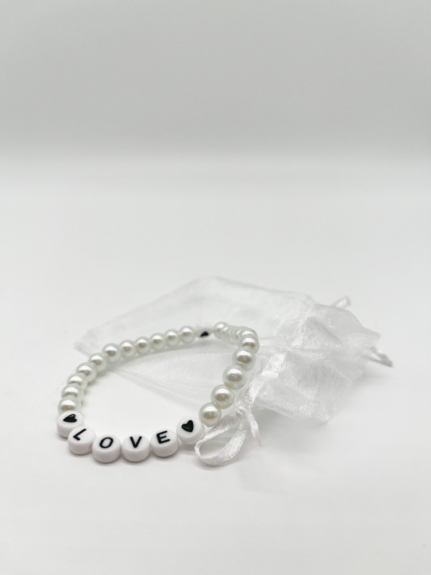 One World | Perlenarmband - Empovver