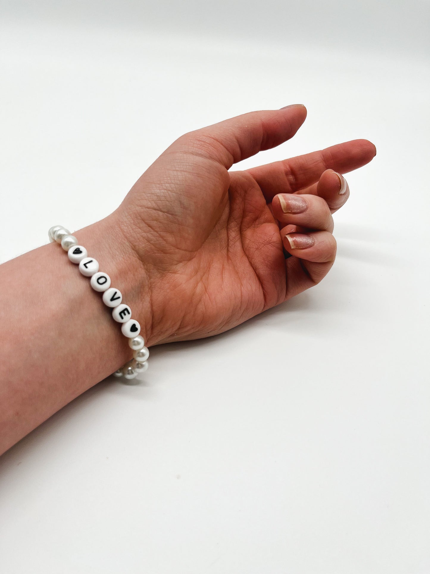 One World | Perlenarmband - Empovver